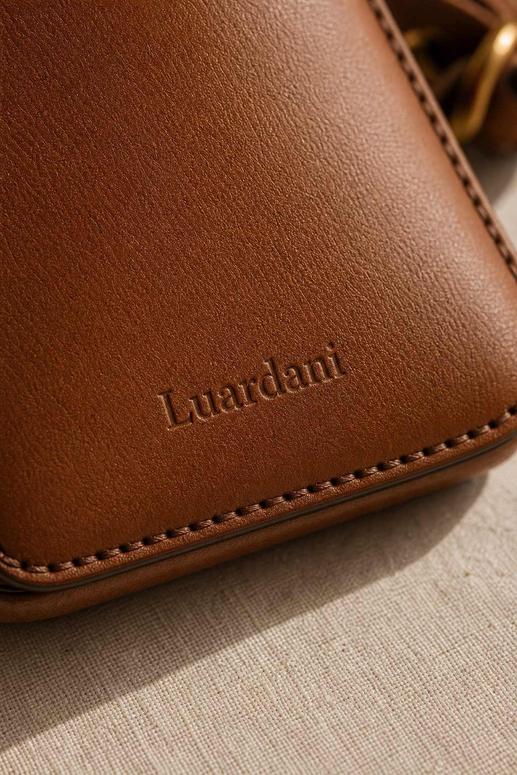 Close-up of refined leather grain and Luardani blind emboss